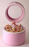 Pink wooden musical box with animated birthday cake and teddy bear scene
