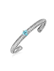 Sterling Silver Bangle with a Blue Topaz and Diamond Accented Station