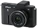 Nikon 1 V1 Systemkamera (10 Megapixel, 7,5 cm (3 Zoll) Display) schwarz inkl. 1 NIKKOR 10 mm Pancake Objektiv