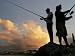 Acehnese Men Fish During Sunset at Ulee Lheue Beach in Banda Aceh, Indonesia Photogra...