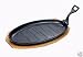 from Apollo CAST IRON SIZZLING DISH DETACHABLE HANDLE WOODEN BASE