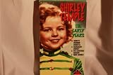 Shirley Temple: The Early Years (Dora's Dunkin' Donuts /  Managed Money / Pie Covered Wagon / War Babies) [VHS]