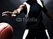Wallmonkeys Peel and Stick Wall Decals - Professional Basketball Player in Action against Dark Background - Removable Graphic