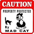 CAUTION: MAD CAT PROTECTION warning sign