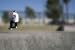Skateboarder Riding over Lip of Ramp at a Skate Park - 24
