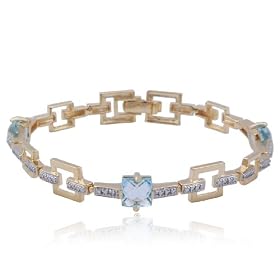 18k Yellow Gold Overlay Sterling Silver Blue Topaz and Diamond Bracelet, 7 by Amazon.com Collection