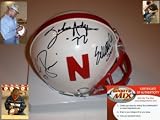 NEBRASKA CORNHUSKERS HEISMAN SIGNED MINI HELMET