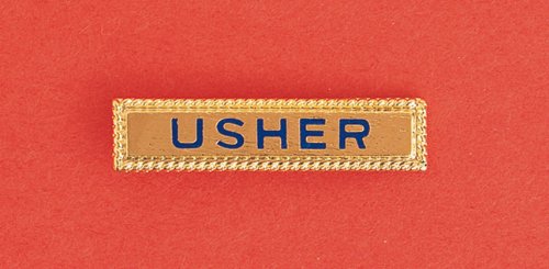 Usher Pin: Handsome 1 3/8x5/16 Inches Gold Bar with Safety Catch. Usher in Dark Blue Enameled Letters.