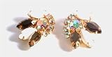 Image of Ladies vintage Juliana rhinestone and milk glass clip on earrings set in a gold coloured metal - design 12390