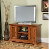 Home Styles Homestead TV Stand in Distressed Warm Oak Finish