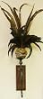Wrought Iron and Wood Wall Sconce with Feathers Floral Arrangement