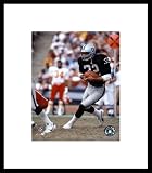 Marcus Allen - Black Uniform With Ball, Marcus Allen Framed Poster Print by Unknown, 13x15