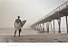 In The Mist - Poster (Surfer On Foggy Beach) (Photography By Jason Ellis) (Size: 36" x 24")