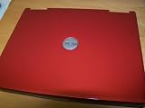 REFURBISHED METALLIC ORANGE DELL D600 LAPTOP