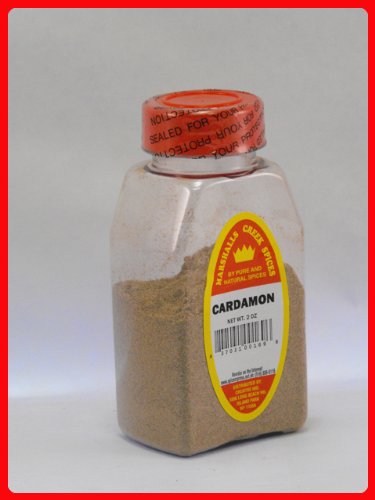 CARDAMOM GROUND FRESHLY PACKED IN LARGE JARS,