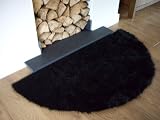 from Bedding Online Black Faux Fur Sheepskin Modern Style Rug Non Slip Half Moon Shape Machine Washable 70cm X 140cm