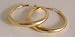 Ladies fashion earrings gold coloured metal hoop design - 12005