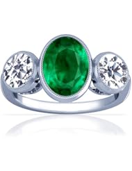 Platinum Oval Cut Emerald Three Stone Ring
