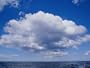 White, Fluffy Clouds Form Above the Water at Twofold Bay in Australia Photographic Poster Print by Jason Edwards, 24x18