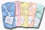 Lavender Cuddle Bug Cloverleaf Swaddling Blanket. Uniquely designed, double-layer swaddling blanket for newborns and babies. Two layers of 100% cotton flannel. Front: Solid lavender flannel; reverse: multi-colored juvenile-print flannel. Approximately 34 inches X 34 inches.