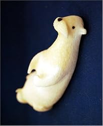 IVORY OTTER by JOHN APANAKOK