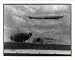 Historic Print (L): [Lakehurst, N.J. GRAF ZEPPELIN flying over hangar; U.S. Army diri...