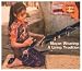 Mayan Weaving: A Living Tradition (Crafts of the World (Powerkids Press).)