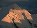 Alpenglow Below Storm Clouds on a Snow Covered Mountain Photographic Poster Print, 24...