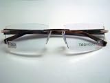 Tag Heuer - TAG HEUER 8102 005 POLISHED BROWN FIBER RIMLESS EYEGLASSES