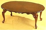 Queen Anne Collection Coffee Table in Cherry Finish By Coaster Furniture