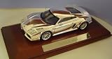 1/43 Scale Chrome Plated Noble M14 Model Car On Wooden Base & Clear Perspex Case