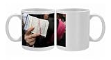 Koran being held during a Muslim demonstration, Paris, France, Europe Photo Mugs