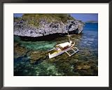 Bangka with Female Passenger on Clear Water, Hundred Islands National Park, Pangasinan, Philippines Framed Photographic Poster Print by John Pennock, 26x22