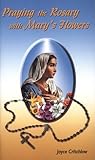 Praying the rosary with Mary's flowers