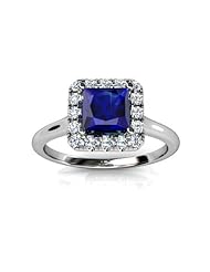 14KT White Gold Gorgeous Halo Style Setting with a 6.5mm Princess Cut Created Blue Sapphire in the Center. 1/6 CTW