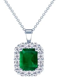 Platinum Emerald Cut Emerald And Round Diamond Pendant