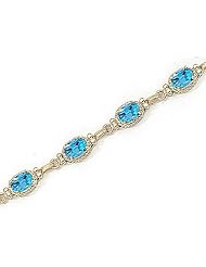 14kt Yellow Gold Oval Blue Topaz Bracelet.