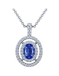 Platinum Oval Cut Blue Sapphire And Round Diamond Pendant