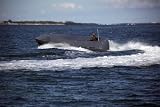 A Multi-role Combat Craft Makees a High Speed Turn off Marathon Key, Florida. - 24"W x 16"H - Peel and Stick Wall Decal by Wallmonkeys