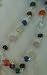Navaratna 53 Bead Necklace with Silver Kamala Caps and Clasp