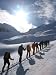 Back Country Skiiers Trudge Uphill in a Straight Line Photographic Poster Print by Sk...