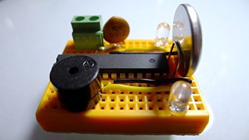 Picoino Water/Rain/Moisture Sensor Alarm Kit, assembled on breadboard with ATmega48PA mcu, low power, runs on battery for many months/years