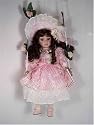 Victorian Doll on Swing in Pink Dress