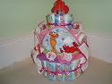 Elmo and Friends Sesame Street Baby Girl (Decorated all Around) 3 Layer Diaper Cake - Comes Decoratively Wrapped Making it a Great Gift or Shower Centerpiece - Other Gift Options Also Available
