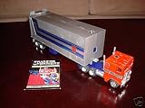 Transformer Generation 1 Original Toy collectable: OPTIMUS PRIME WITH TRAILER Transformer Toy fron G1 Transformers line from the 1980s. (LOOSE FIGURE VERSION)(THIS IS THE ORIGINAL G1 TOY)(THIS IS NOT A REISSUE OR REPRODUCTION)(TRANSFORMER GENERATION 1 TOY)(TRANSFORMER G1 TOY)(AUTOBOT AND DECEPTICON TOYS)IMAGE