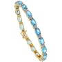 10k Gold 7 in. Tennis Bracelet, w/ Oval Cut (7x5mm) Blue Topaz Stones & 0.25 Carat Brilliant Cut Diamonds, 3/16 in. (5mm) wide