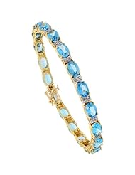 10k Gold 7 in. Tennis Bracelet, w/ Oval Cut (7x5mm) Blue Topaz Stones & 0.25 Carat Brilliant Cut Diamonds, 3/16 in. (5mm) wide