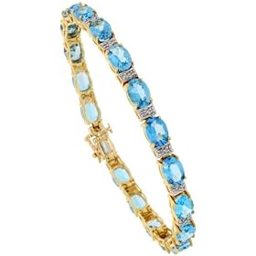 10k Gold 7 Tennis Bracelet, w Oval Cut (7x5mm) Blue Topaz Stones and 0.25... by Gabriella Gold