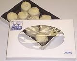 Scott's Cakes 1 lb. White Chocolate Macadamia Nut Pattie in a White Gourmet Box