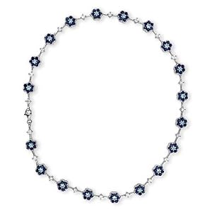 BEAUTIFUL FLOWER SHAPED SAPPHIRE WITH A CENTER BLUE TOPAZ C.Z. NICELY DESIGNED... by